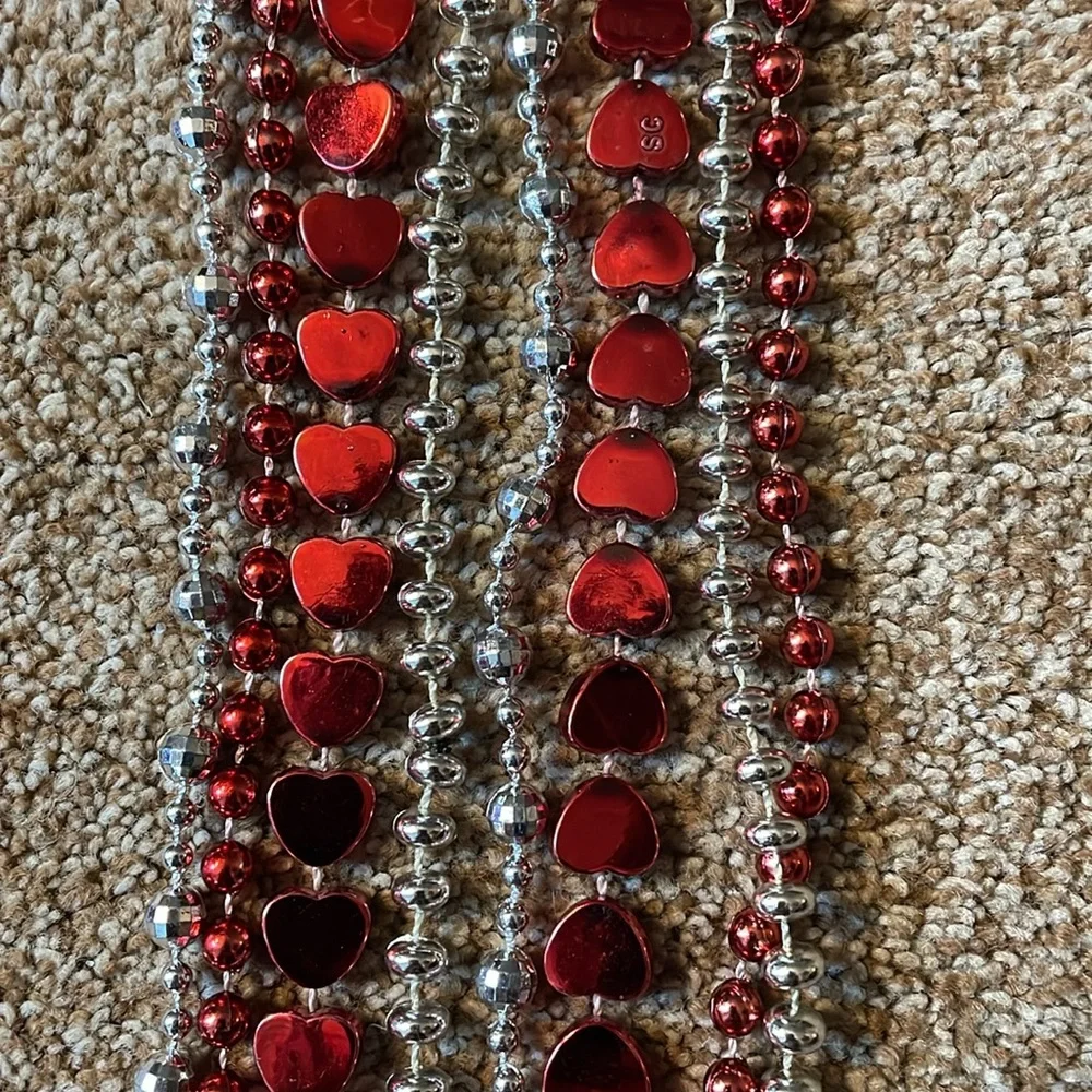 4 plastic Valentine’s Day red & silver Necklaces